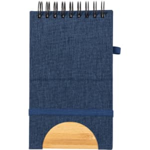 A navy blue spiral-bound notebook with a wooden base and an elastic band. It features a simple logo.