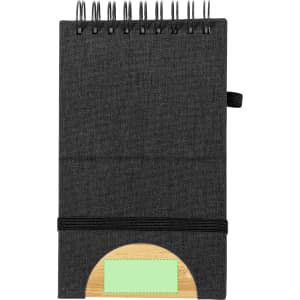 A black spiral-bound notebook with a wooden accent at the bottom and an elastic band for closure.