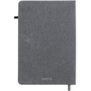 A grey notebook with a textured finish, featuring a ribbon bookmark and a logo on the cover.