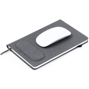 A grey mousepad notebook with a white mouse on top, featuring a soft wrist rest.