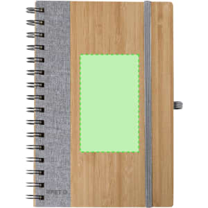 A spiral-bound notebook with a bamboo front cover, grey fabric side, and a green accent area. It features a logo.