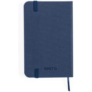 A navy blue notepad with a textured cover, featuring an elastic closure and a ribbon marker. It includes a logo.