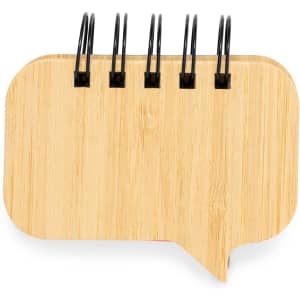 A bamboo sticky notepad shaped like a speech bubble, featuring a black spiral binding.