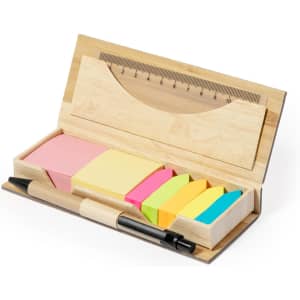 A wooden office set containing sticky notes in pink, yellow, and green, with a pen and ruler included.