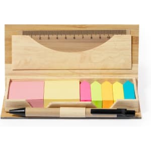 A wooden office set featuring sticky notes in pink, yellow, and bright colours, a pen, and a ruler.