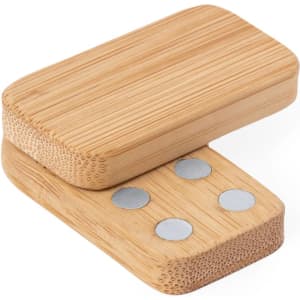 A bamboo stress-relief toy featuring a smooth, rectangular shape with silver dots on one side.