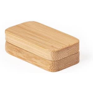 A bamboo stress relief shape with a smooth, light brown finish. It features a rounded design and a natural texture.