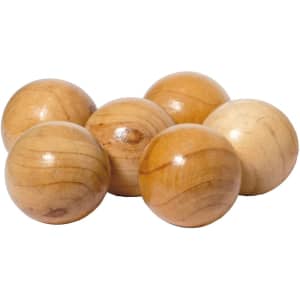 A set of six wooden pétanque balls in varying shades of light brown, featuring a smooth, polished surface.