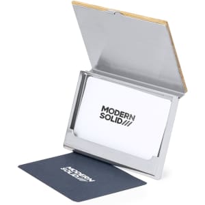 A silver and wooden business card holder with a compartment for cards and an open front displaying a card.