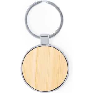 A round keyring with a silver metal frame and a bamboo-style centre.