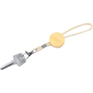 A keyring featuring a round wooden pendant and a metal clip, attached to a fabric loop, in natural tones.