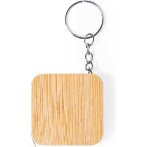 A tape measure with a wooden texture, attached to a silver keyring chain, in a square shape.