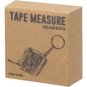 A brown cardboard box containing an Axler 1m tape measure, featuring a keyring and a bamboo design.
