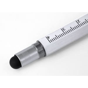 A silver multifunction pen with a ruler along its side and a black rubber tip at the end. It features a logo.
