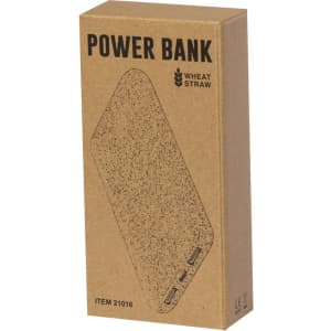 A power bank in a cardboard box, featuring a textured wheat straw design and two USB ports.