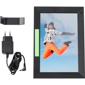 A digital photo frame in black, featuring a vibrant display and accompanied by a stand, charger, and cable.