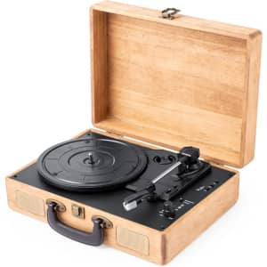 A portable vinyl record player in a wooden case, featuring a black turntable and controls.