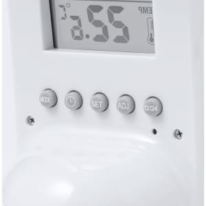 A white weather station featuring a digital display, buttons for setting, and a temperature reading.