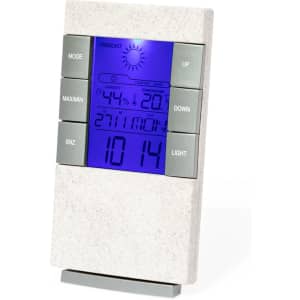 A weather station with a light grey body and blue display, featuring buttons for mode and temperature adjustments.
