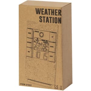 A weather station in a brown cardboard box featuring a simple design and buttons for settings.