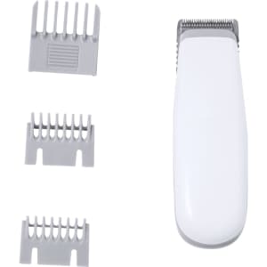 A white hair trimmer with three grey comb attachments, designed for personal grooming.