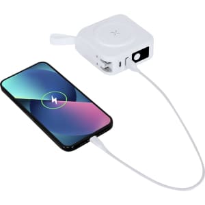 A white travel adapter with USB ports connected to a smartphone, showcasing a sleek and compact design.