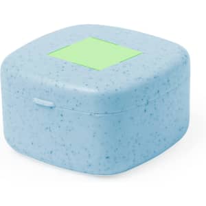 A square blue storage container with a speckled pattern and a green label area on the top.