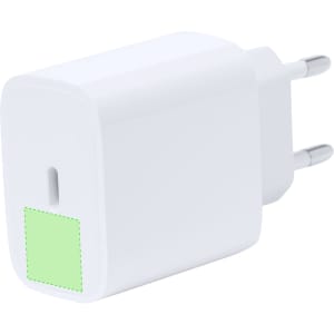 A white USB charger with a green patch, featuring a two-pronged plug and a logo.