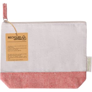 A toiletry bag made of recycled cotton, featuring a cream body and a coral-coloured bottom. It has a logo and a tag.