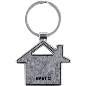 A grey house-shaped keyring with a metal ring and a logo on the front.