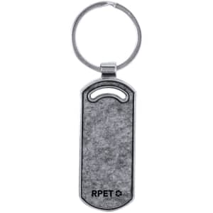 A grey keyring with a circular metal ring and a rectangular body featuring a logo.