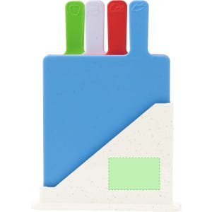 A set of four chopping boards in blue, green, red, and purple, stored in a white stand with a logo.