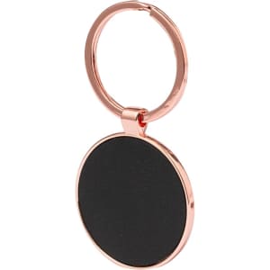 A rose gold keyring featuring a circular black attachment and a smooth finish, designed for holding keys.