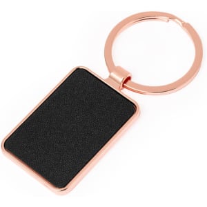 A rose gold keyring with a rectangular black surface for personalisation. Features a circular attachment loop.