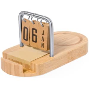A wooden perpetual desk calendar with metal rings holding date cards, featuring natural bamboo colour.