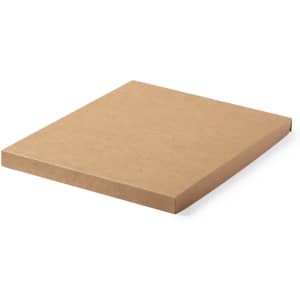 A plain brown kraft notebook with a smooth, flat cover. The product has a minimalist design and no visible branding.
