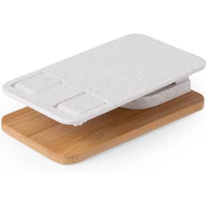 A white phone stand made from eco-friendly material, featuring a bamboo base. It has a simple, sleek design.