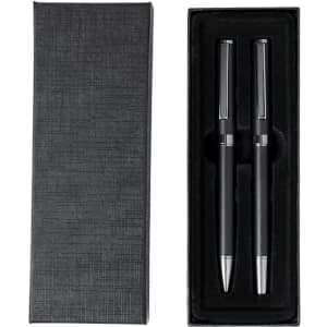 A black gift box containing two black metal pens with silver accents and textures.