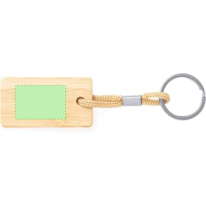 A bamboo keyring featuring a green rectangular insert and a silver metal ring for attachment.