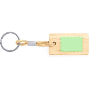 A bamboo keyring featuring a green rectangular area, attached to a metal ring with a woven cord.