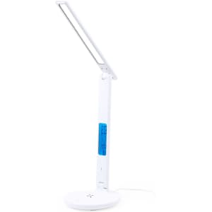 A white multifunction lamp with a digital display and a wireless charging base. The lamp has a sleek, modern design.