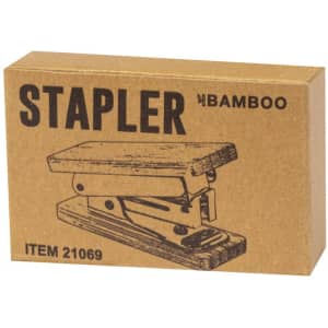 A bamboo stapler in a brown cardboard box, featuring a simple illustration and branding.
