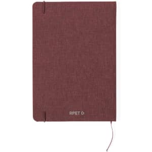 A maroon notepad with a textured cover and an elastic closure, featuring a logo on the front.