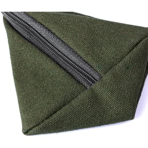 A green Zarynix Purse with a grey zipper and a triangular design. Features a branding logo.