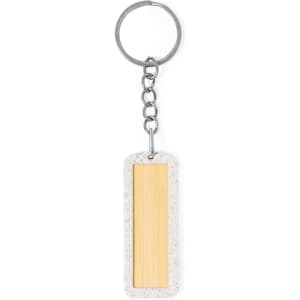 A keyring featuring a rectangular wooden element set in a grey material, attached to a metal chain and ring.
