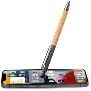 A stylus touch ball pen with a cork grip and metallic finish, resting on a smartphone displaying various apps.
