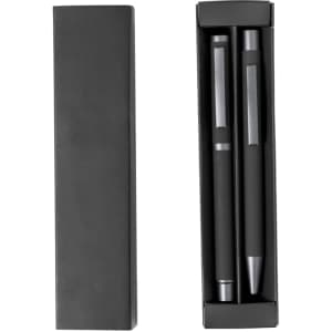 A black gift box containing two metal pens, one with a smooth finish and the other with a textured grip.