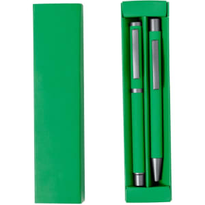 A green gift box containing two metal pens with black accents. The box has a simple design and includes a logo.