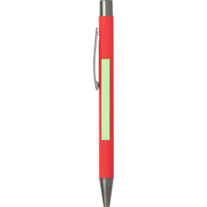 A metal pen in bright red with a green accent and silver clip, featuring a branding logo.