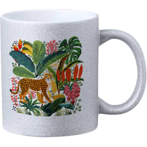 A vibrant silver mug featuring a decorative jungle scene with a leopard surrounded by colourful plants and flowers.